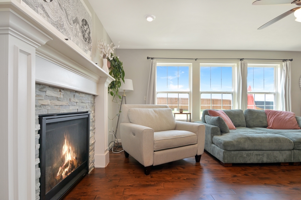 1711 Flagstone Drive Normal, IL 61761 - Photo 54 of 65 a living room with furniture and a fireplace