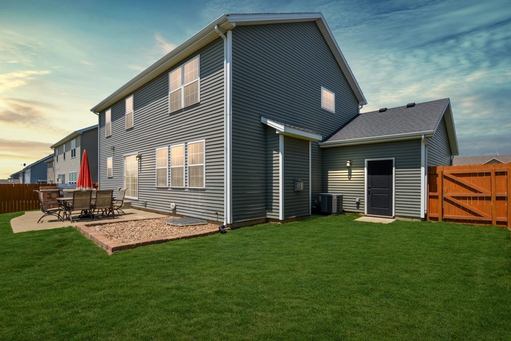 1711 Flagstone Drive Normal, IL 61761 - Photo 61 of 65 a view of a house with backyard and porch