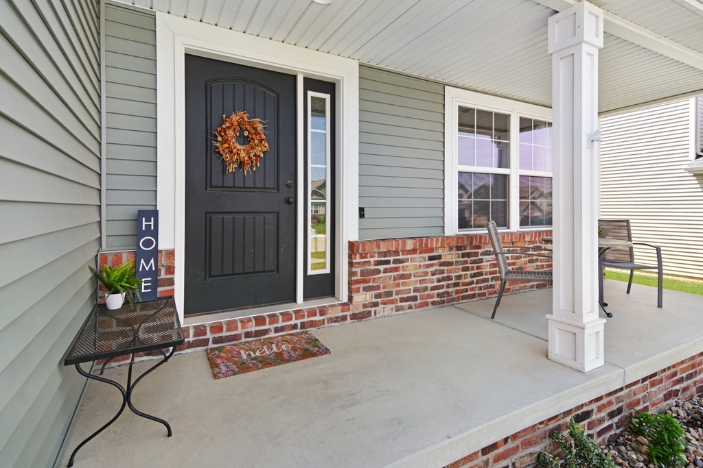 1711 Flagstone Drive Normal, IL 61761 - Photo 65 of 65 a front view of a house with outdoor seating