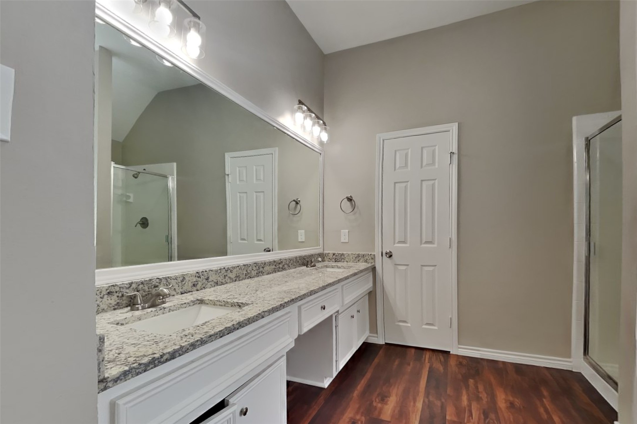 12711 Cedar Grove Court Humble, TX 77346 - Photo 12 of 20 a bathroom with a granite countertop sink and a mirror