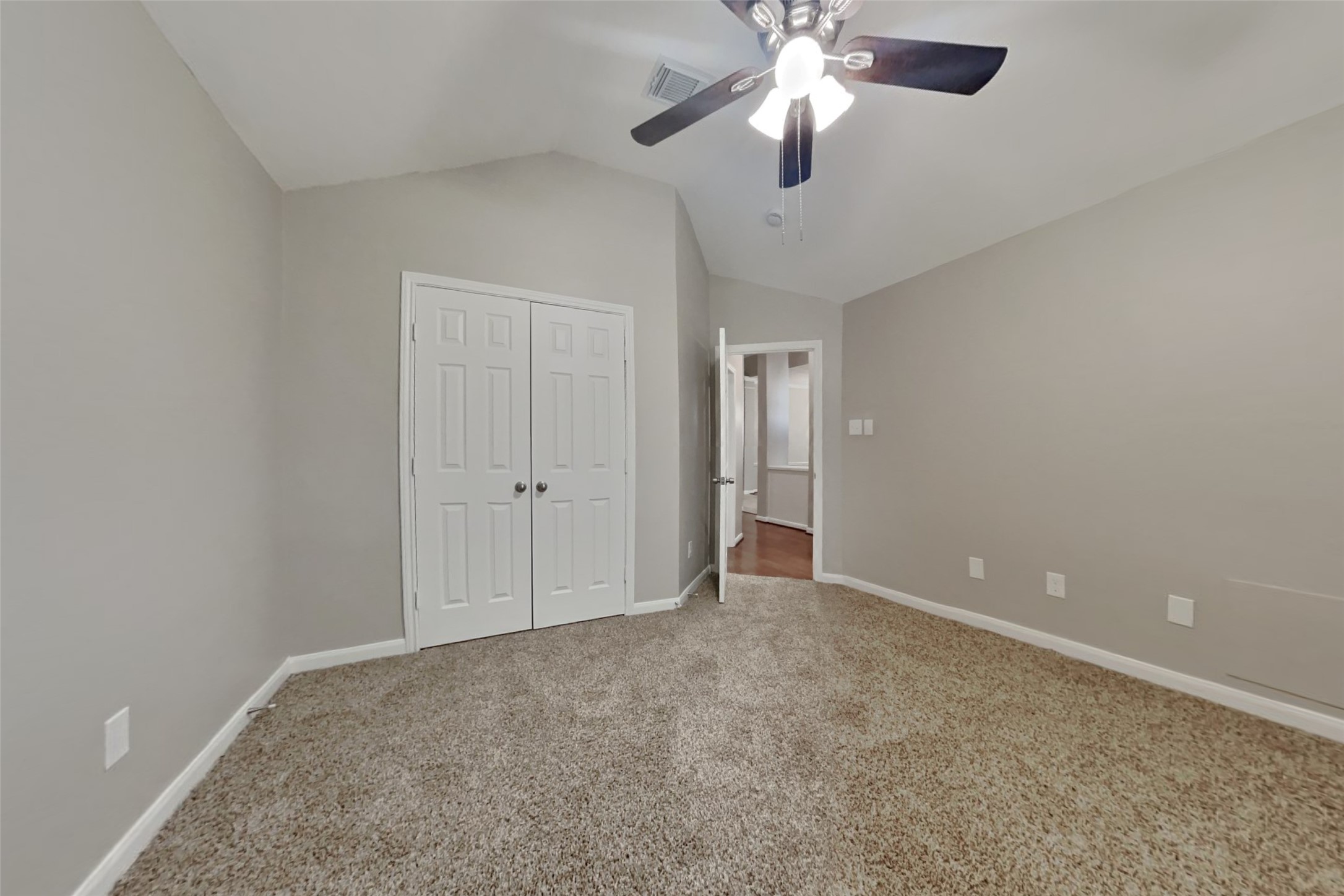 12711 Cedar Grove Court Humble, TX 77346 - Photo 14 of 20 a view of an empty room and chandelier fan