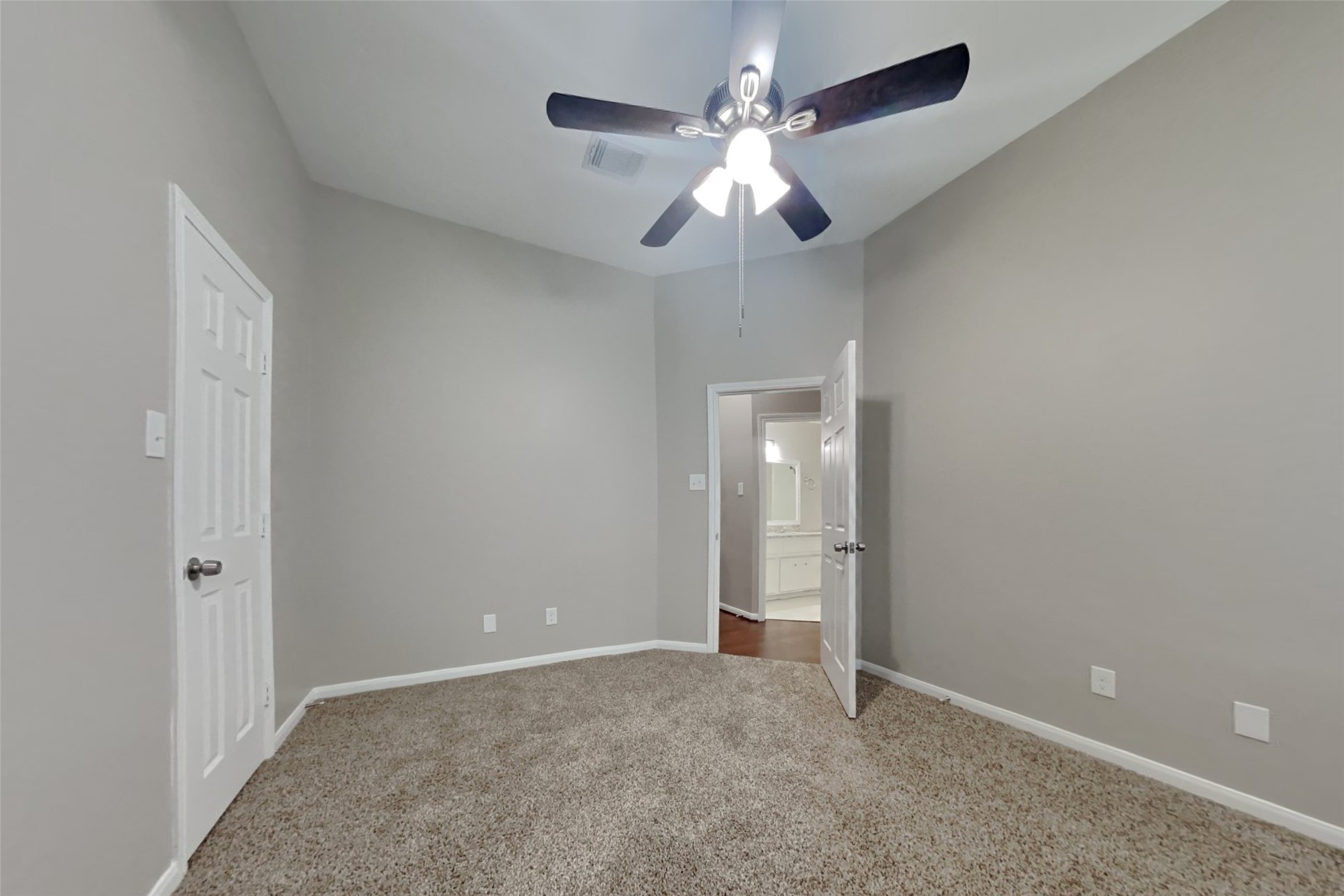 12711 Cedar Grove Court Humble, TX 77346 - Photo 15 of 20 an empty room with chandelier fan