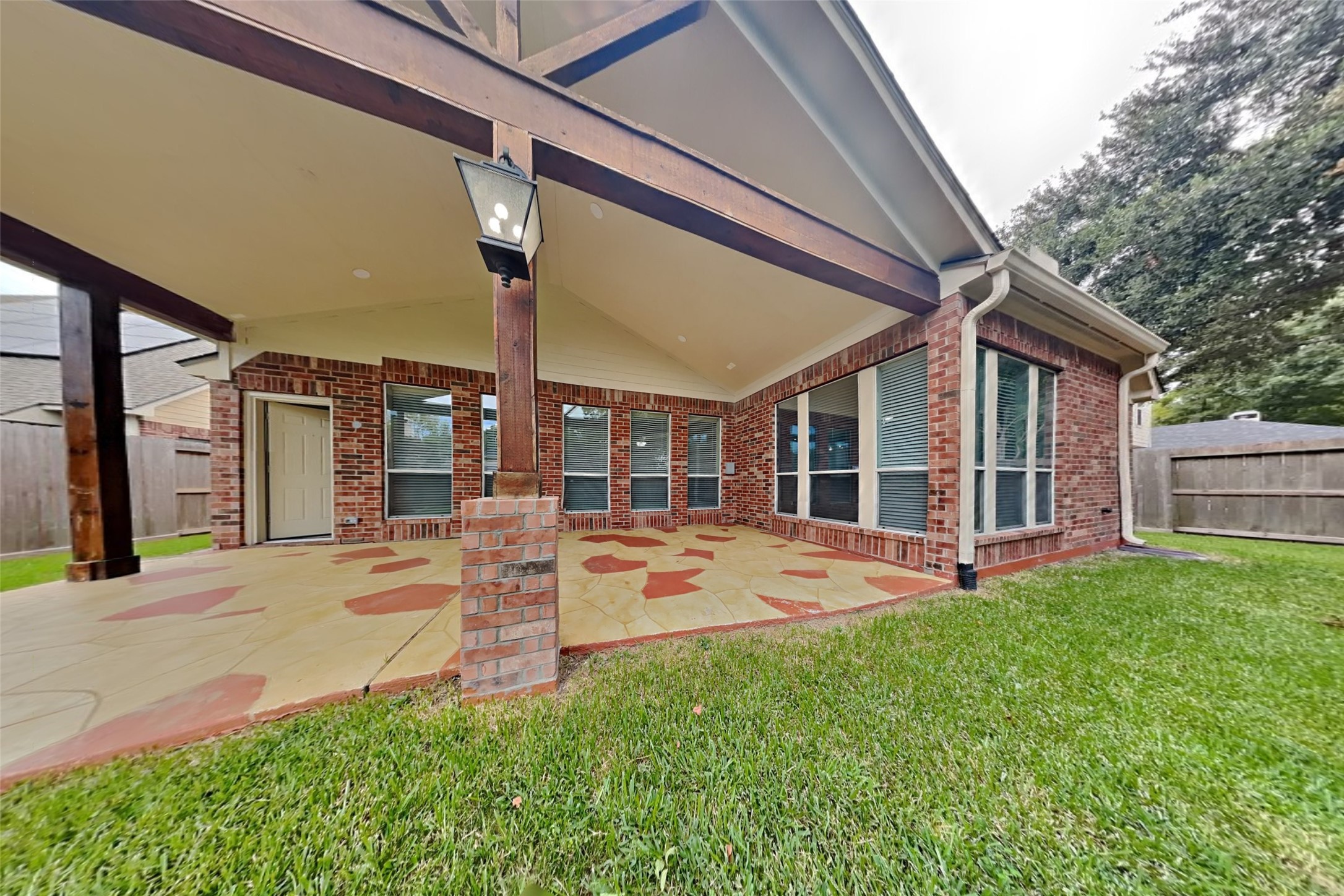 12711 Cedar Grove Court Humble, TX 77346 - Photo 19 of 20 a view of a house with backyard sitting area and garden