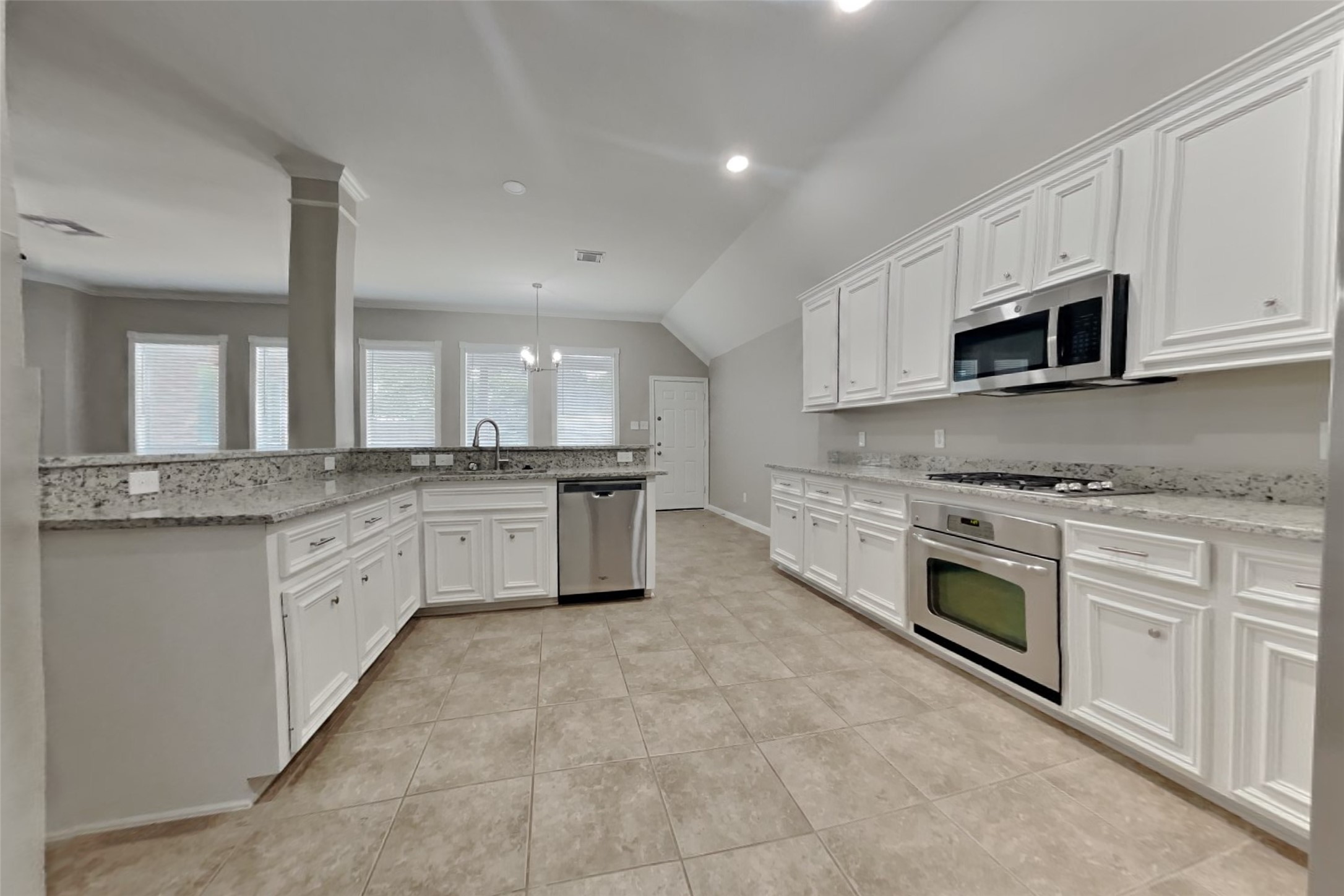12711 Cedar Grove Court Humble, TX 77346 - Photo 4 of 20 a large kitchen with cabinets appliances and a counter space