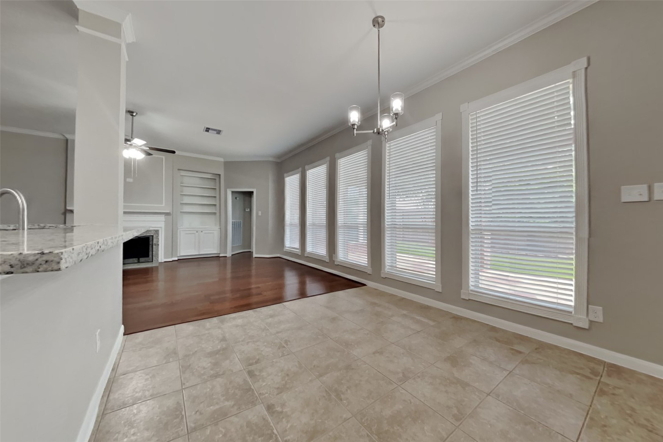12711 Cedar Grove Court Humble, TX 77346 - Photo 6 of 20 a view of an empty room with window and cabinet