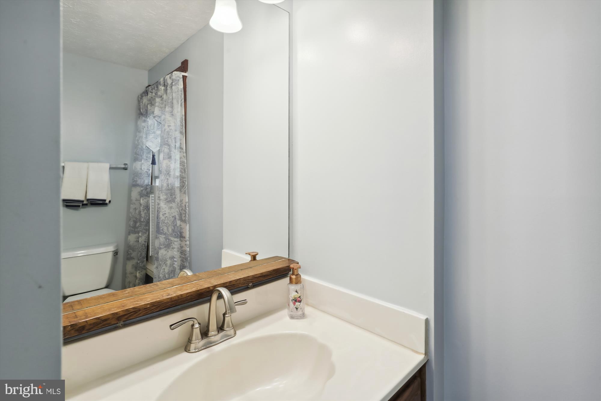 1125 Windmill Lane Silver Spring, MD 20905 - Photo 17 of 37 Half bathroom on the main floor