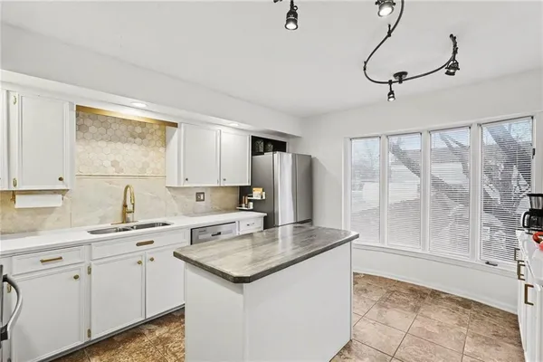 $324,950 | 8721 Riggs Lane, Overland Park, KS 66212