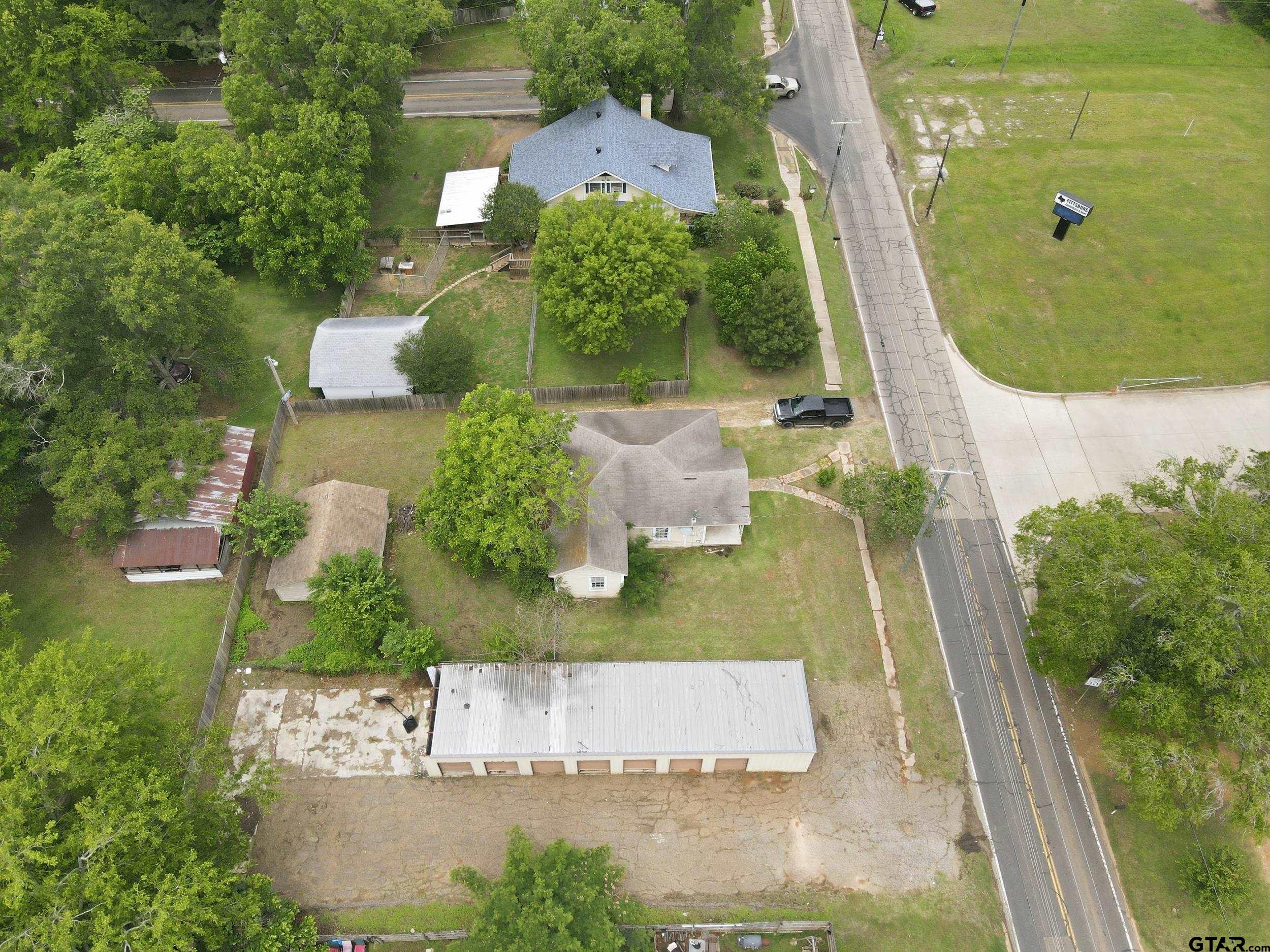 405 Rusk Street Pittsburg, TX 75686 - Photo 29 of 33 an aerial view of a house