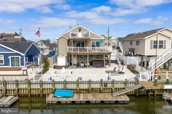 a front view of a house with swimming pool