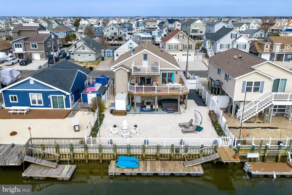 an aerial view of a house with swimming pool