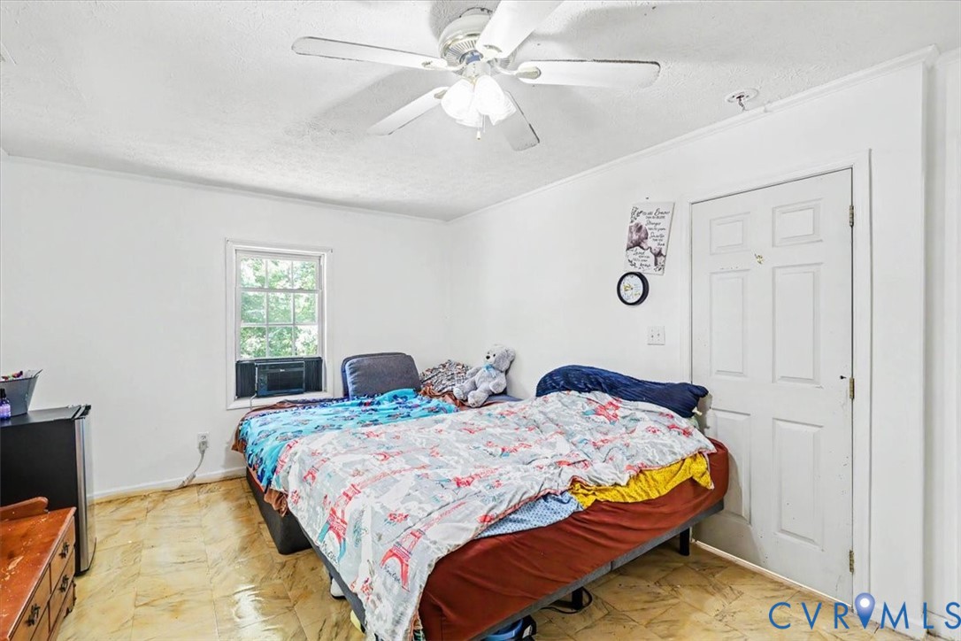 62 The Fls Road Victoria, VA 23974 - Photo 20 of 36 Bright room featuring a window, a paneled door, an