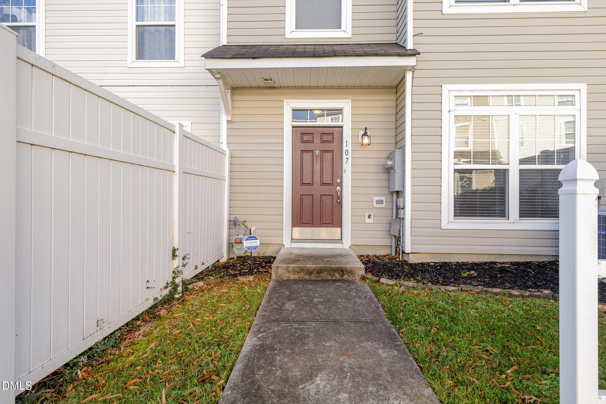 8620 Neuse Club Lane Raleigh, NC 27616 - Photo 26 of 26 a front view of a house with a yard