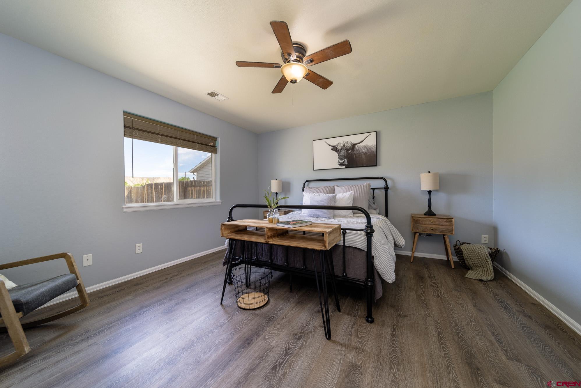 1531 Haystack Road Montrose, CO 81401 - Photo 13 of 34 a bedroom with furniture and a window