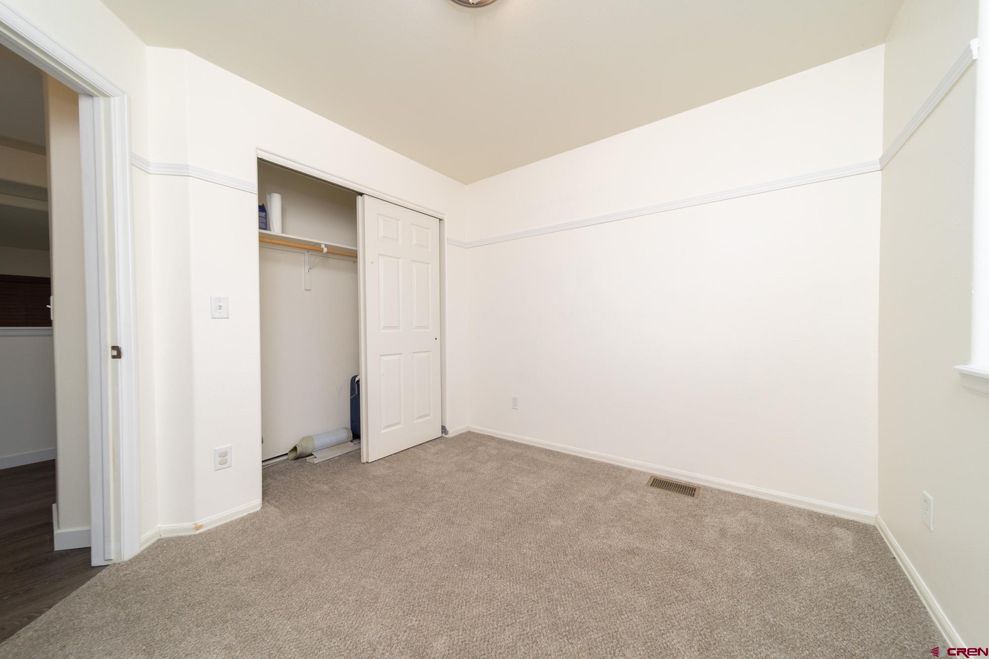1531 Haystack Road Montrose, CO 81401 - Photo 22 of 34 an empty room with closet