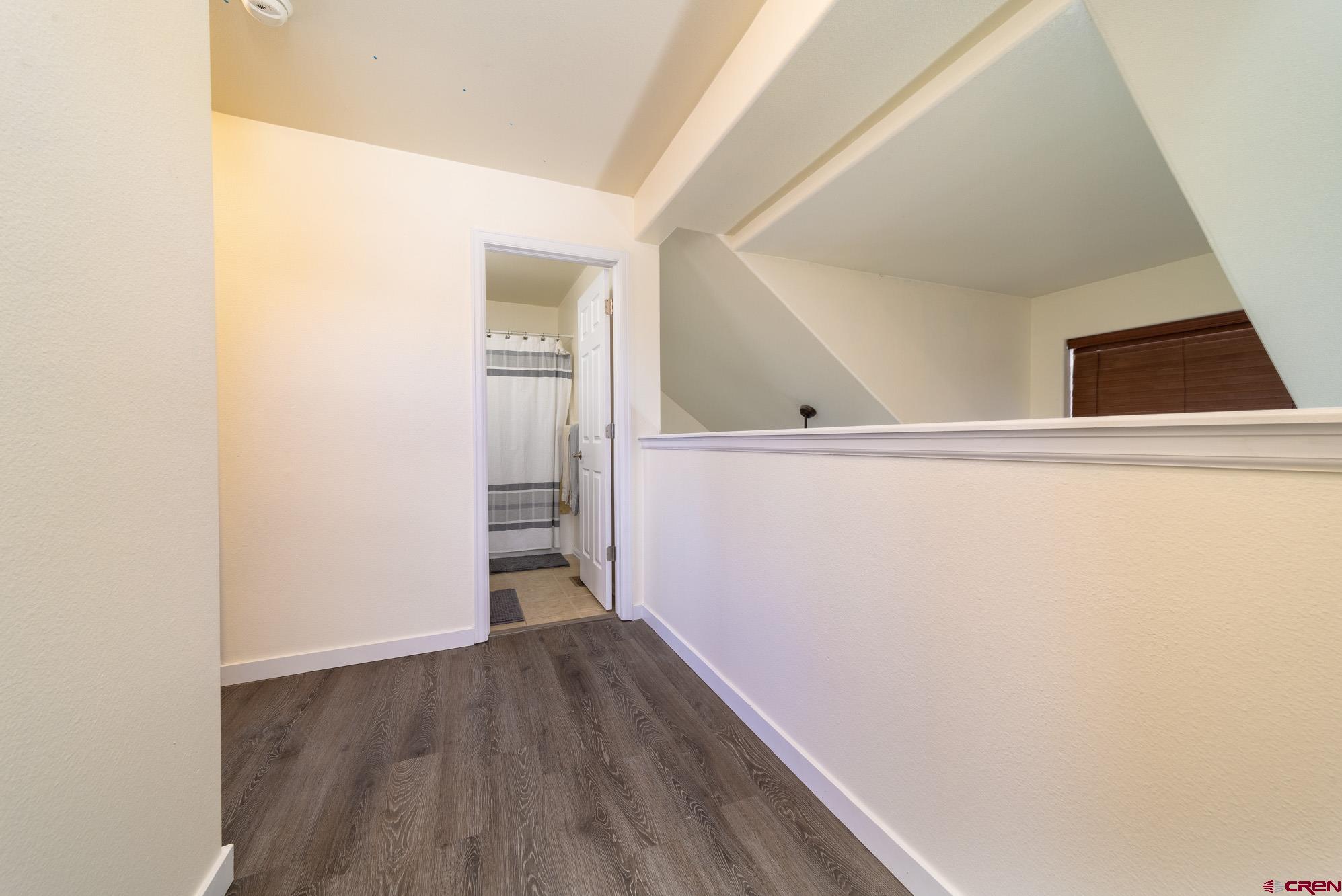 1531 Haystack Road Montrose, CO 81401 - Photo 27 of 34 a view of small space with wooden floor