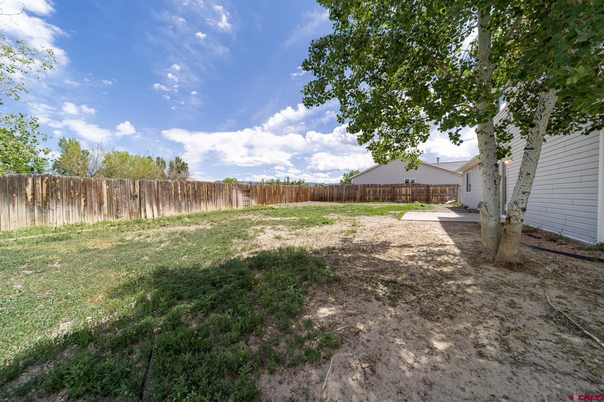 1531 Haystack Road Montrose, CO 81401 - Photo 29 of 34 a view of a yard with a fountain