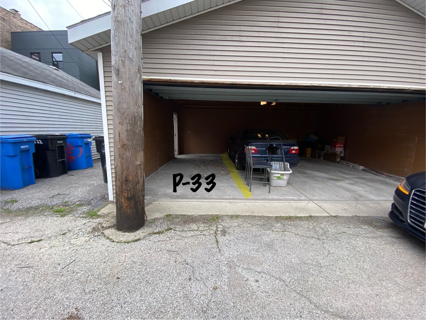 a view of a patio with table and chairs