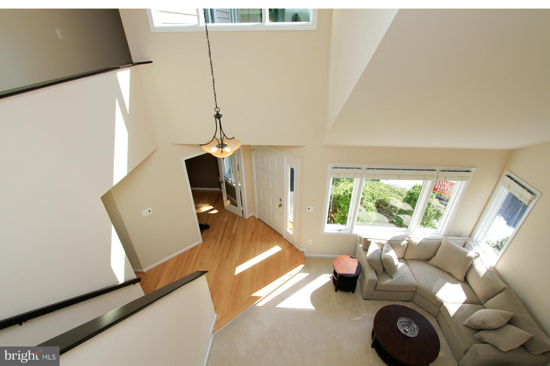 1304 Pavilion Club Way Reston, VA 20194 - Photo 14 of 30 a living room with furniture and a window