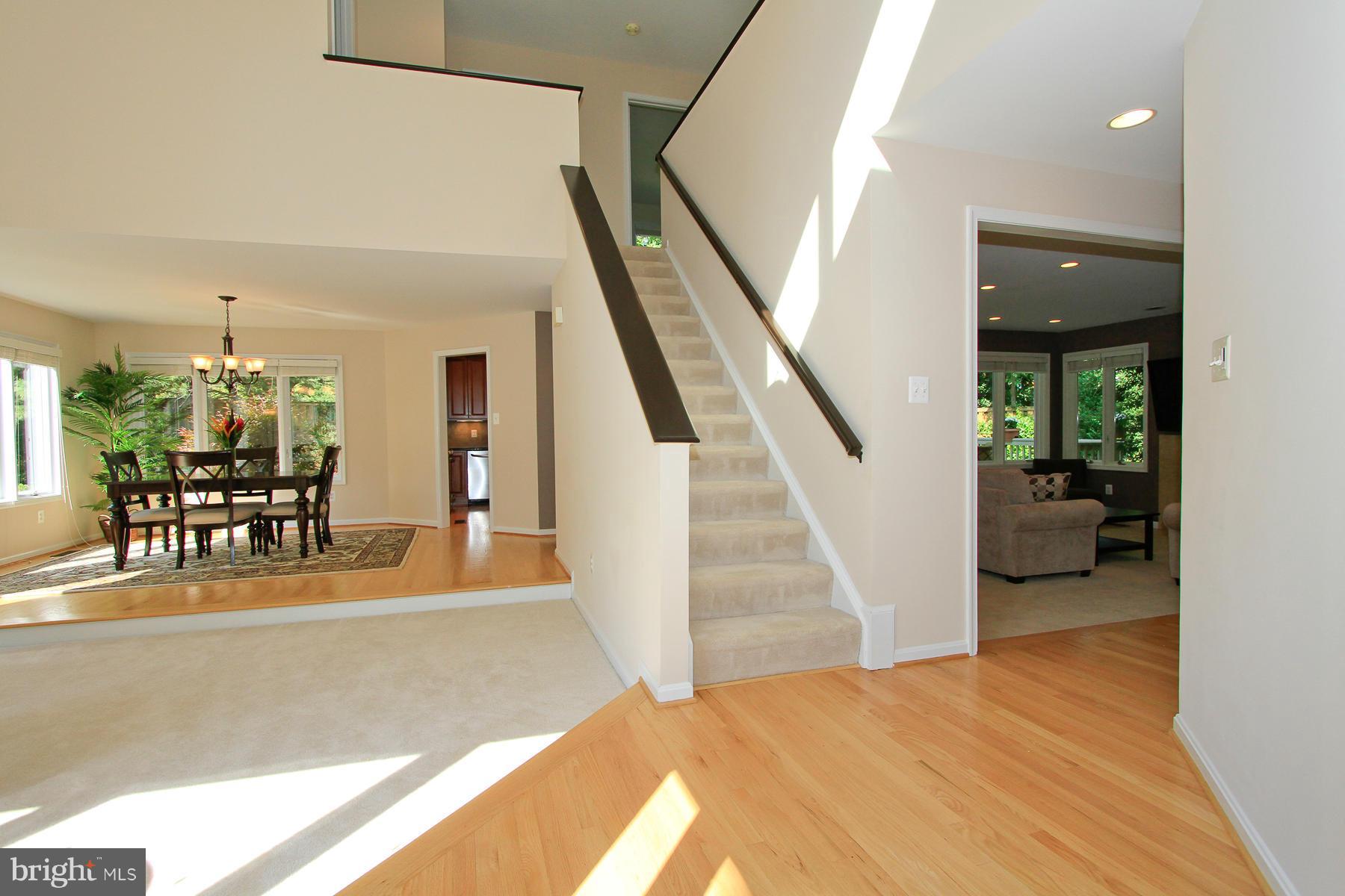 1304 Pavilion Club Way Reston, VA 20194 - Photo 4 of 30 a view of a livingroom with furniture and an entryway