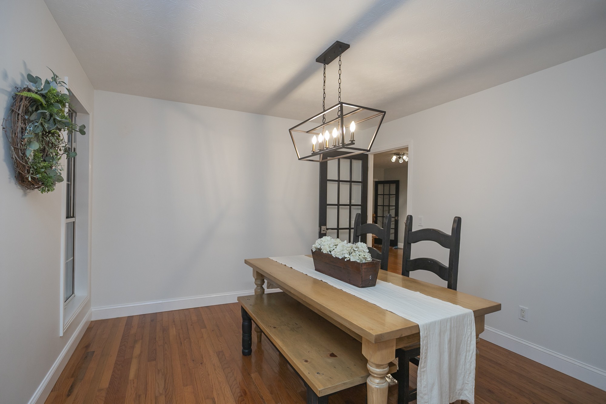 848 Philadelphia Road Lebanon, TN 37087 - Photo 12 of 50 a view of a dining room with furniture and wooden floor