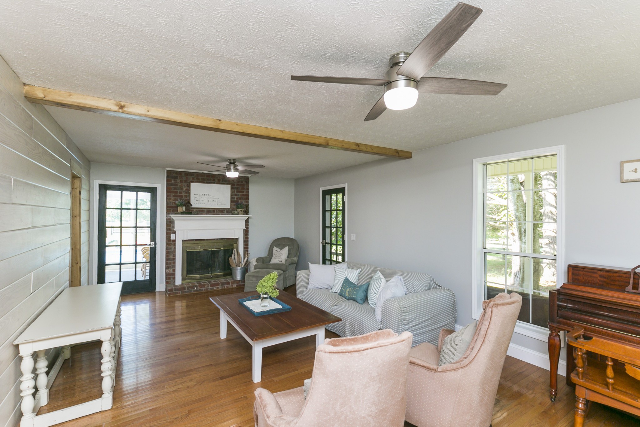 848 Philadelphia Road Lebanon, TN 37087 - Photo 13 of 50 a living room with fireplace furniture and a wooden floor