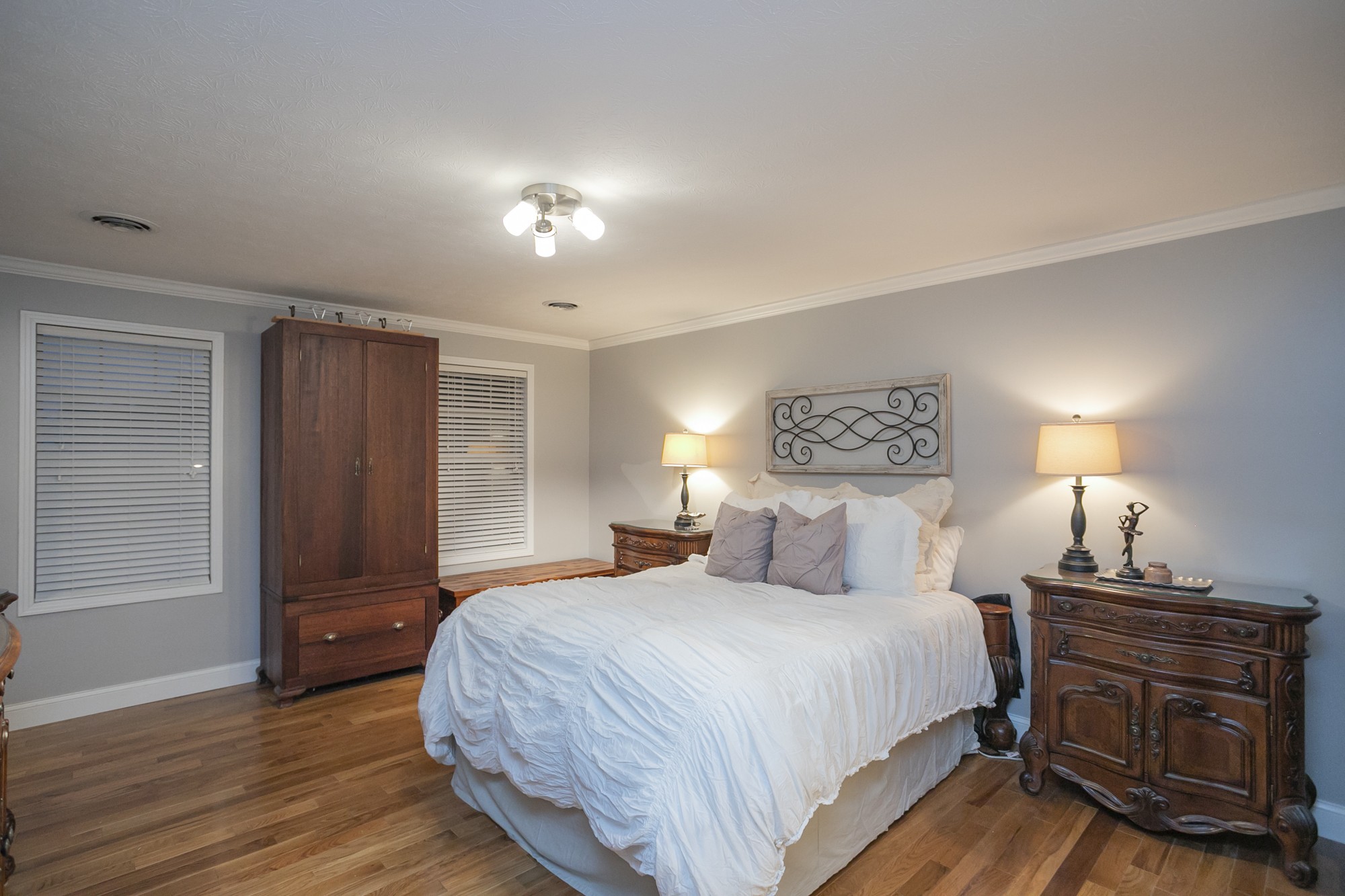848 Philadelphia Road Lebanon, TN 37087 - Photo 18 of 50 a bedroom with a bed and wooden floor