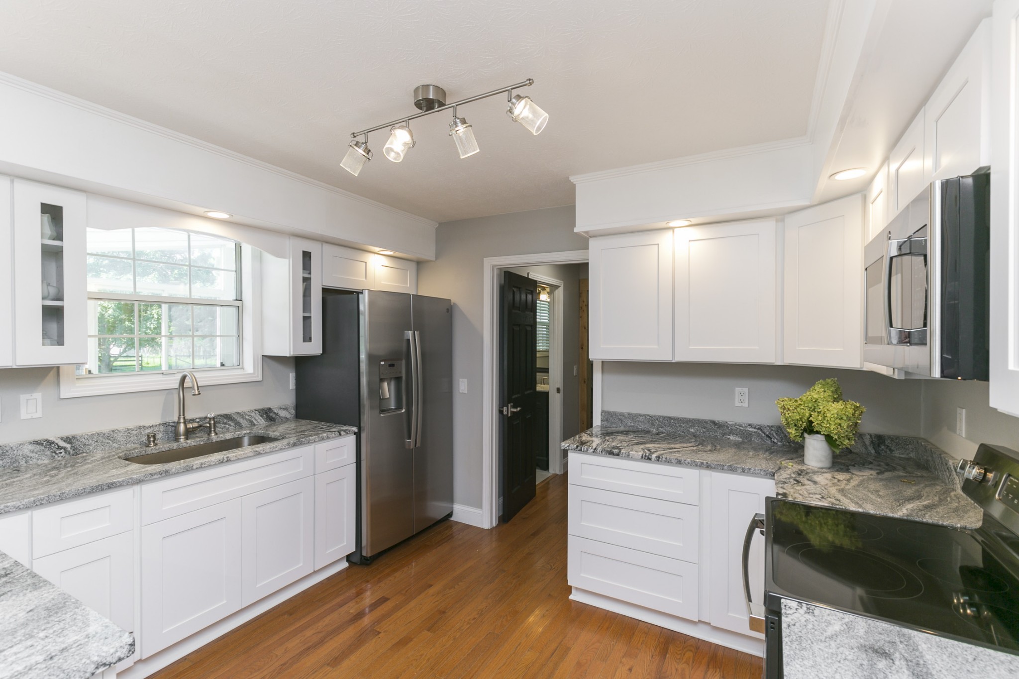 848 Philadelphia Road Lebanon, TN 37087 - Photo 3 of 50 a kitchen with a refrigerator and a sink