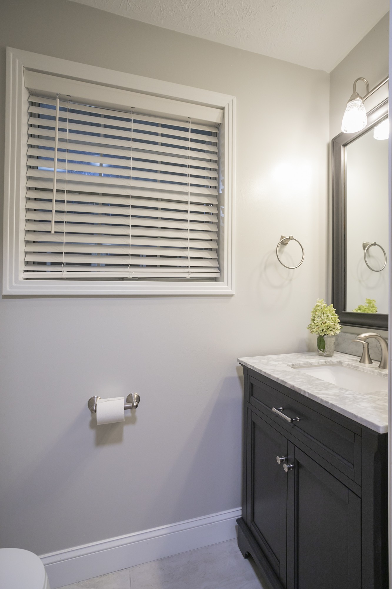 848 Philadelphia Road Lebanon, TN 37087 - Photo 26 of 50 a bathroom with a granite countertop sink a mirror and a window