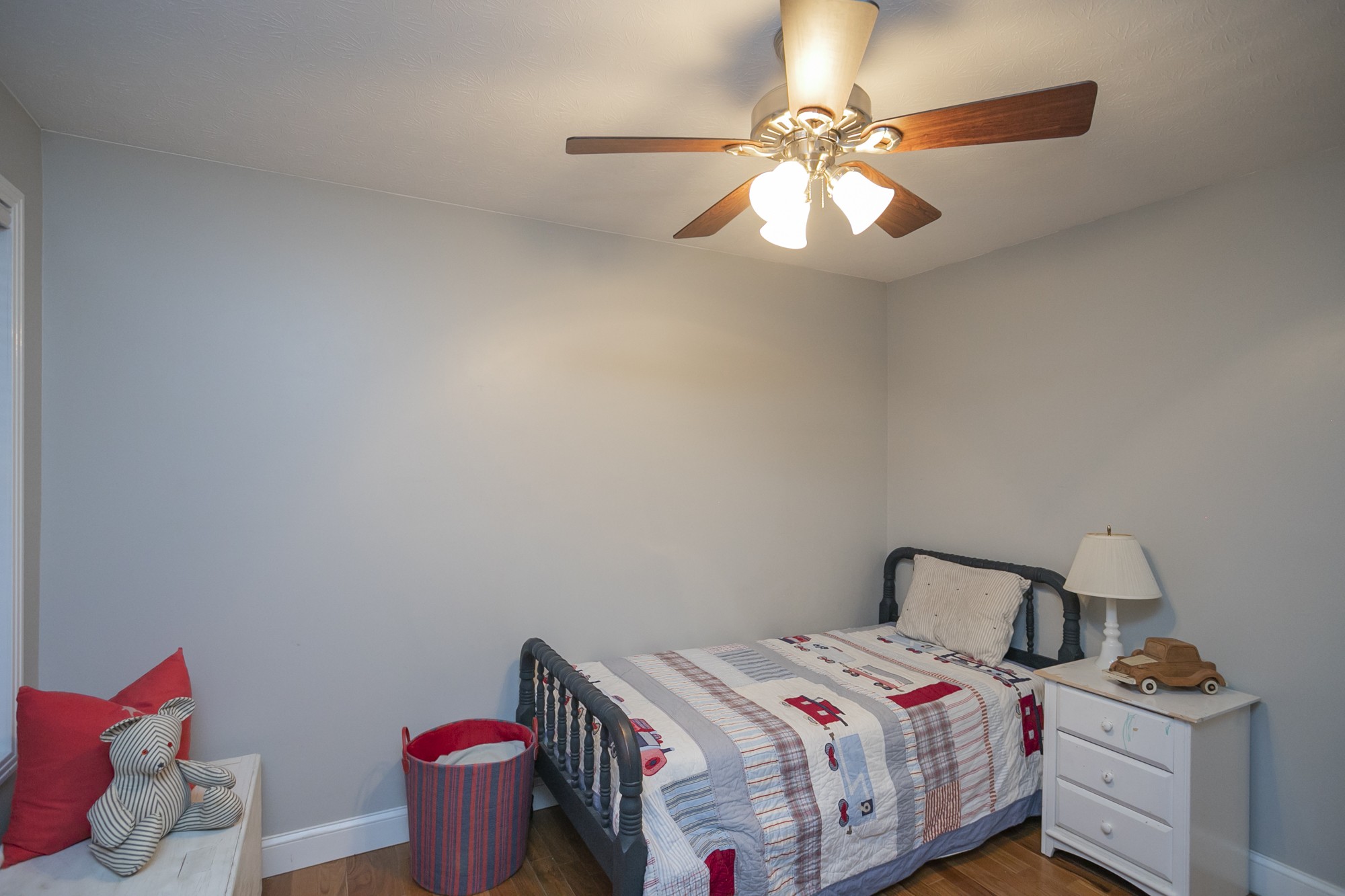 848 Philadelphia Road Lebanon, TN 37087 - Photo 32 of 50 a bedroom with a bed and a chandelier