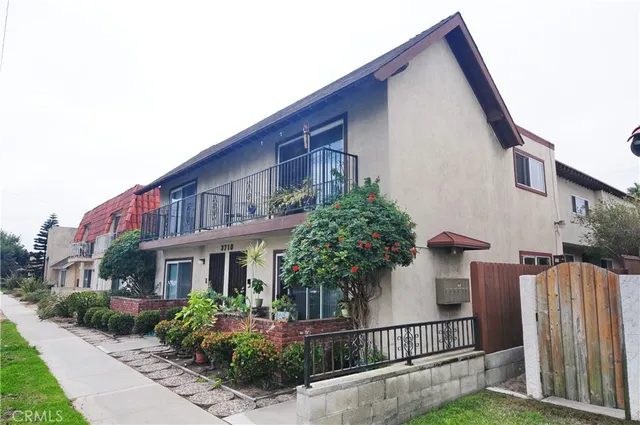 a front view of a house with yard