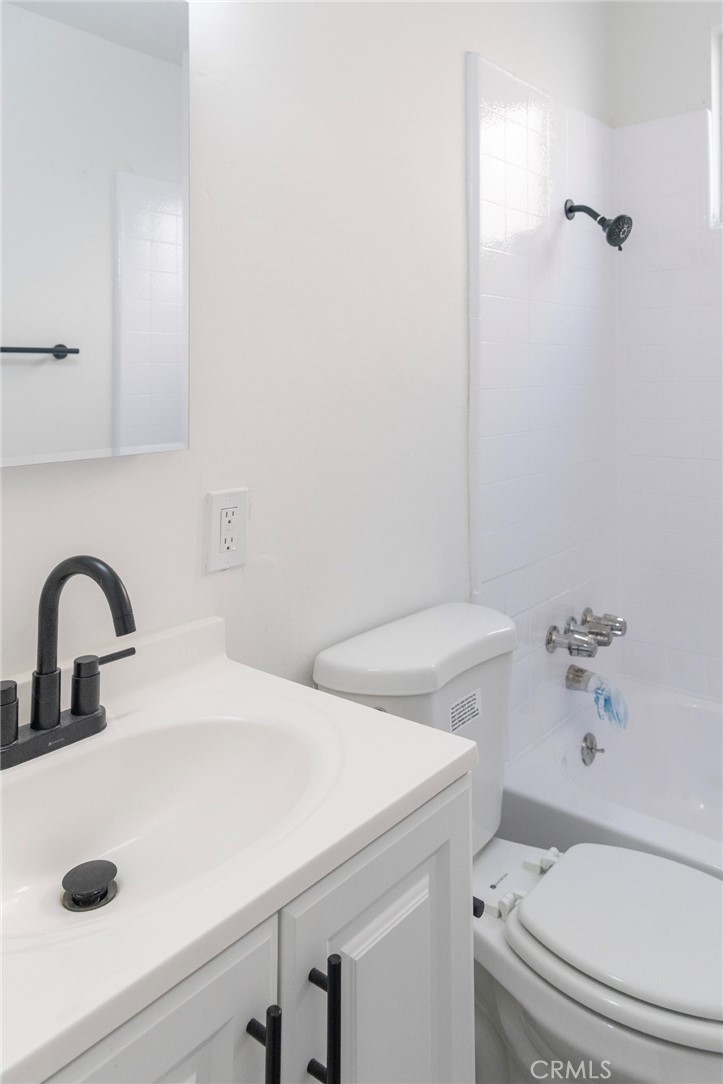 2107 Pullman Lane Redondo Beach, CA 90278 - Photo 12 of 16 a bathroom with a sink and a toilet