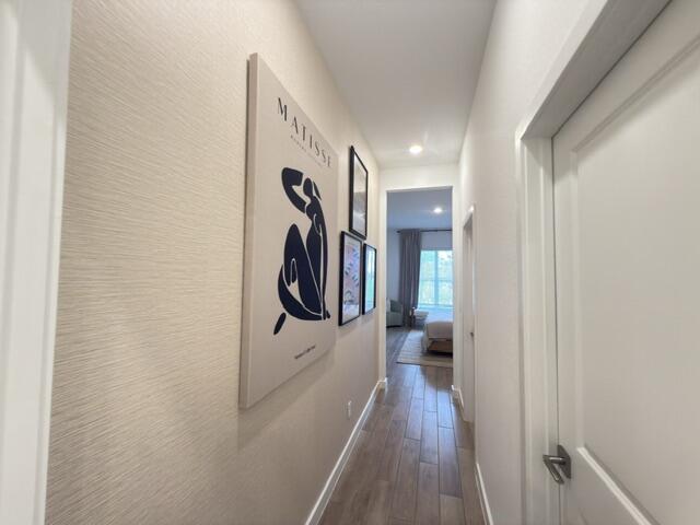19696 Weathervane Way Loxahatchee, FL 33470 - Photo 13 of 39 a hallway view with a washer and dryer