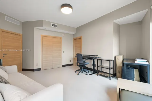 a front view of a building with street view