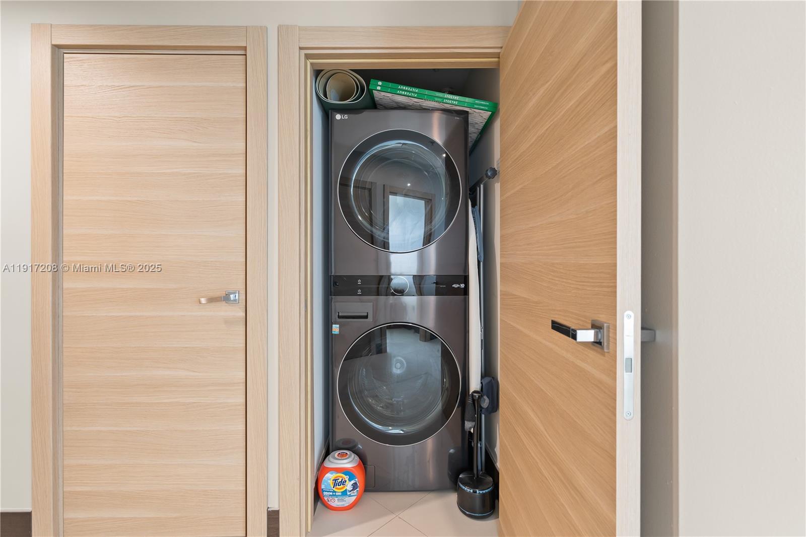 60 Southwest 13th Street, Unit 1400 Miami, FL 33130 - Photo 23 of 46 a close view of a utility room with washer and dryer