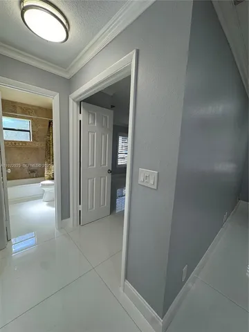 a view of kitchen with furniture and a window