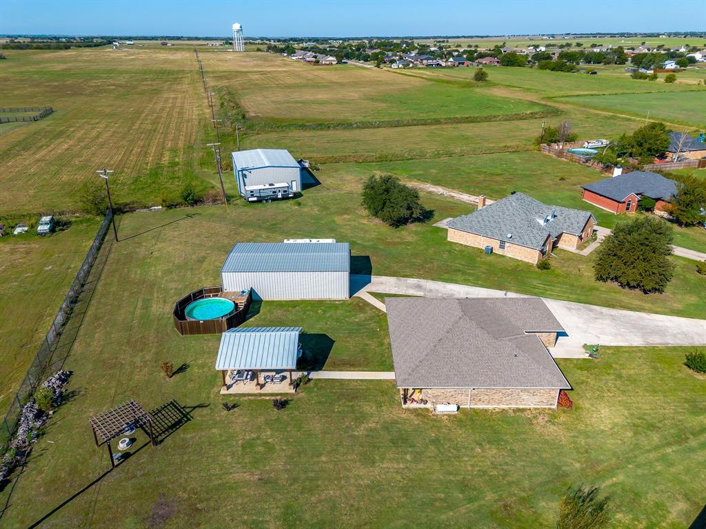 206 King George Way Ponder, TX 76259 - Photo 30 of 32 an aerial view of a house with a ocean view