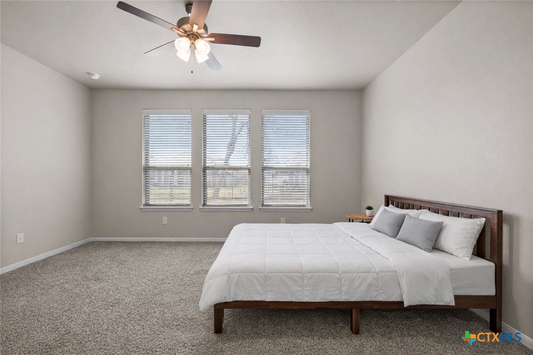 620 Ripplewood Drive Temple, TX 76502 - Photo 14 of 29 a bedroom with a bed and window