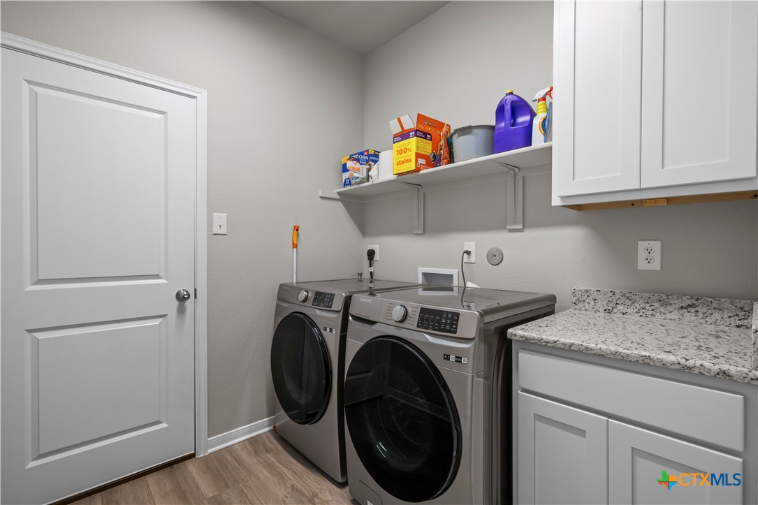 620 Ripplewood Drive Temple, TX 76502 - Photo 22 of 29 a utility room with dryer and washer