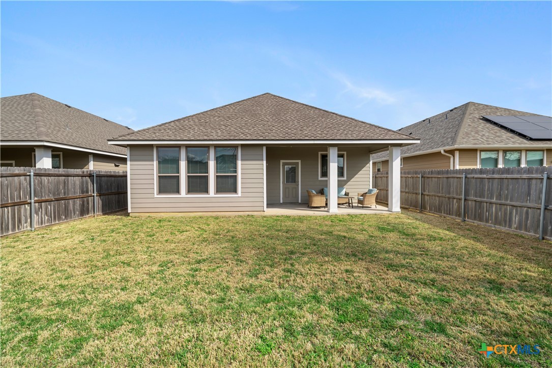 620 Ripplewood Drive Temple, TX 76502 - Photo 25 of 29 a front view of a house with a garden and yard