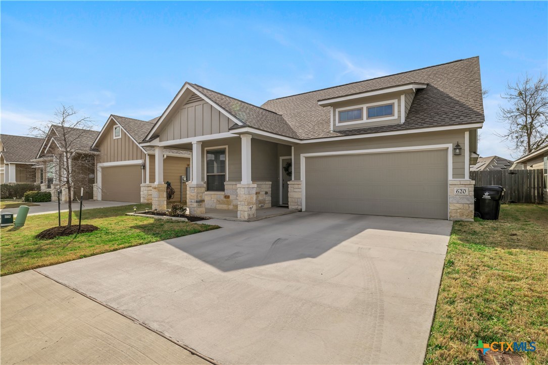 620 Ripplewood Drive Temple, TX 76502 - Photo 27 of 29 a front view of a house with a yard and garage