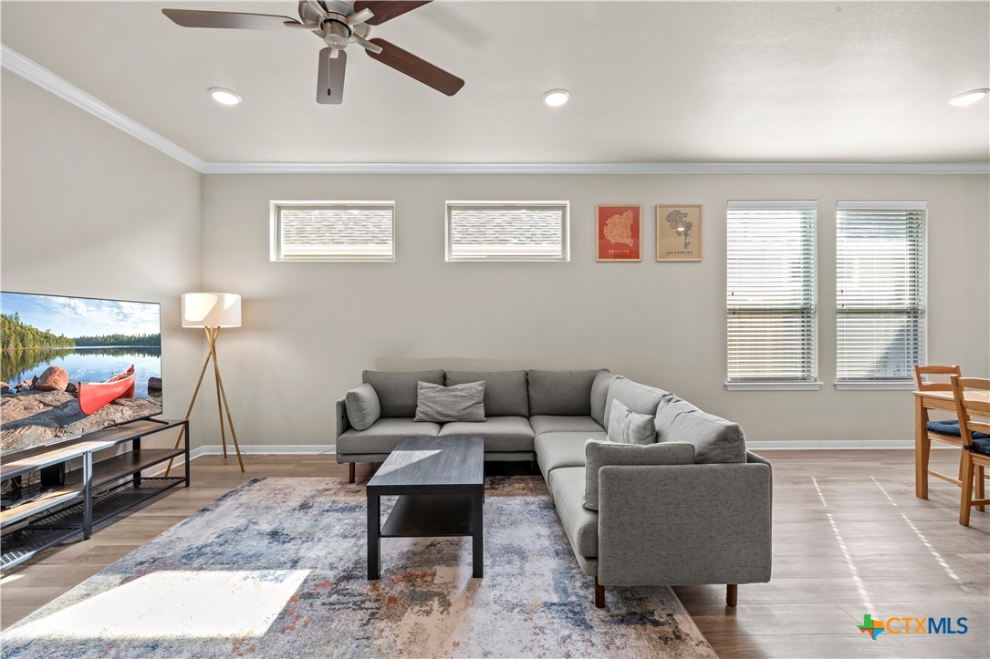 620 Ripplewood Drive Temple, TX 76502 - Photo 5 of 29 a living room with furniture and a flat screen tv