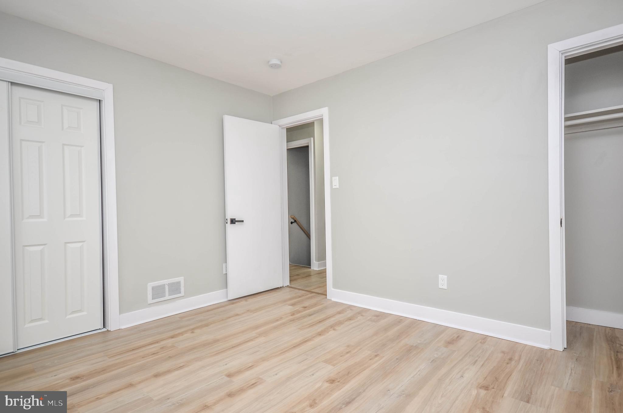 2110 Rolander Street Hyattsville, MD 20783 - Photo 16 of 33 a view of an empty room with wooden floor