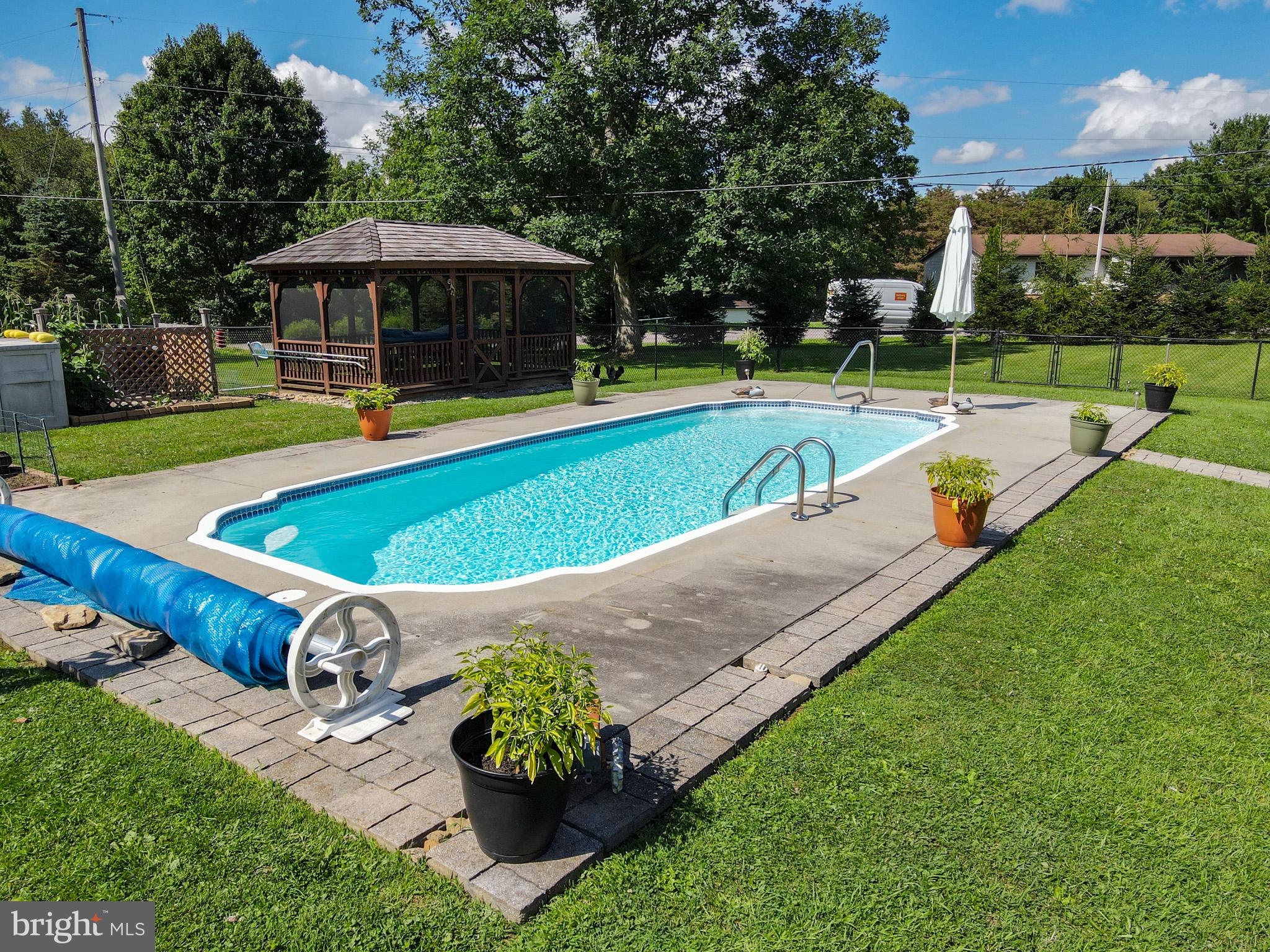 265 Fearer Road Friendsville, MD 21531 - Photo 53 of 75 Sunny oasis with inviting poolside.