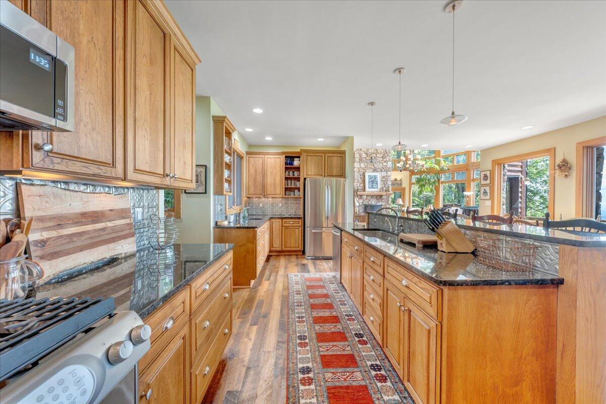 490 Lookout Ridge Lane Copper Hill, VA 24079 - Photo 19 of 69 a kitchen with large windows