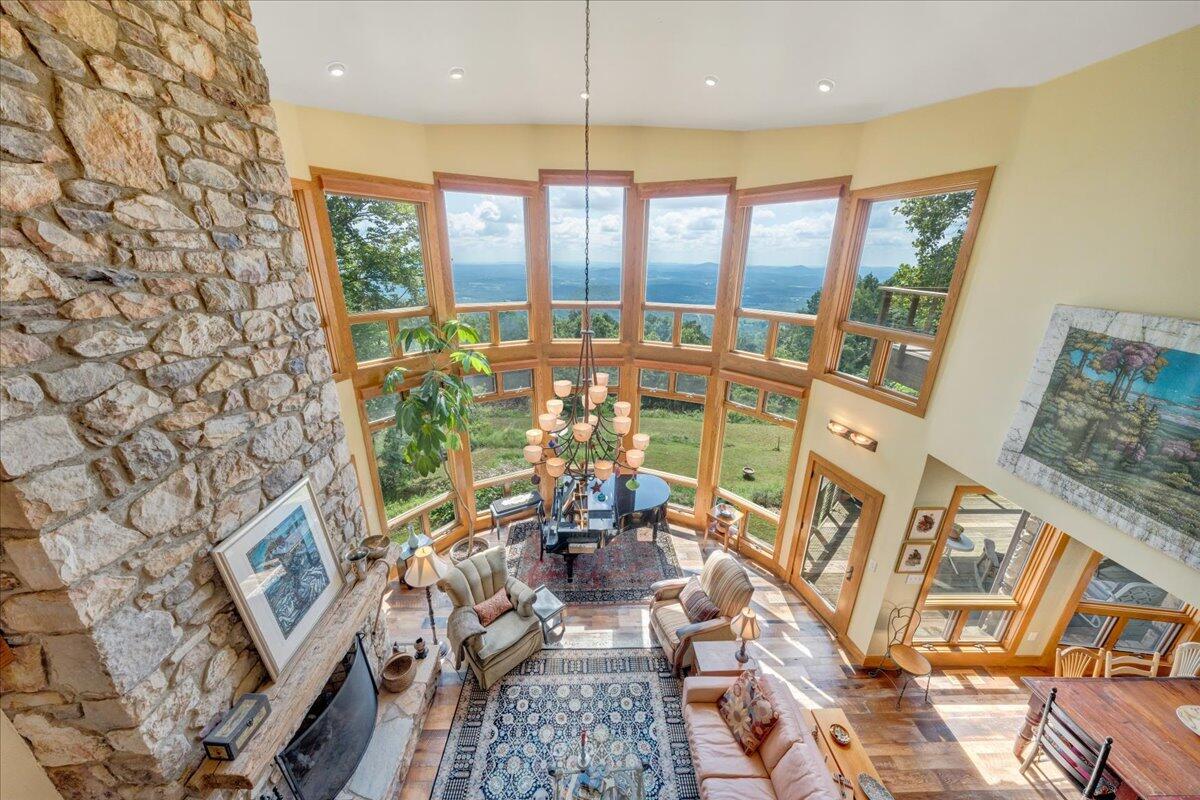 490 Lookout Ridge Lane Copper Hill, VA 24079 - Photo 28 of 69 a living room with furniture and a large window