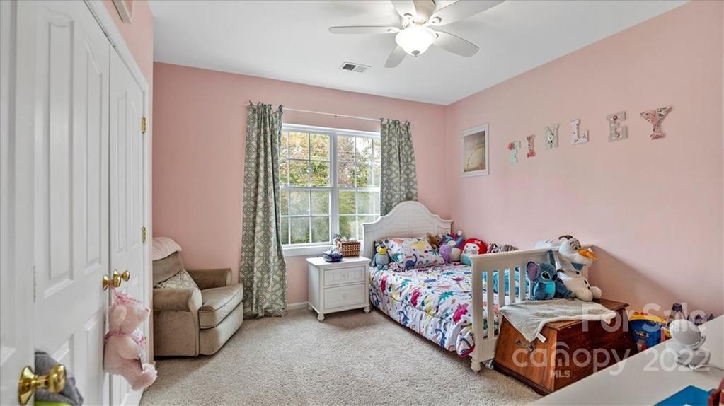 2001 Dataw Lane Indian Trail, NC 28079 - Photo 25 of 38 a bedroom with bed and a window