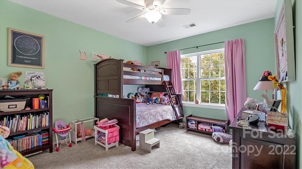 2001 Dataw Lane Indian Trail, NC 28079 - Photo 26 of 38 a bedroom with furniture and a window