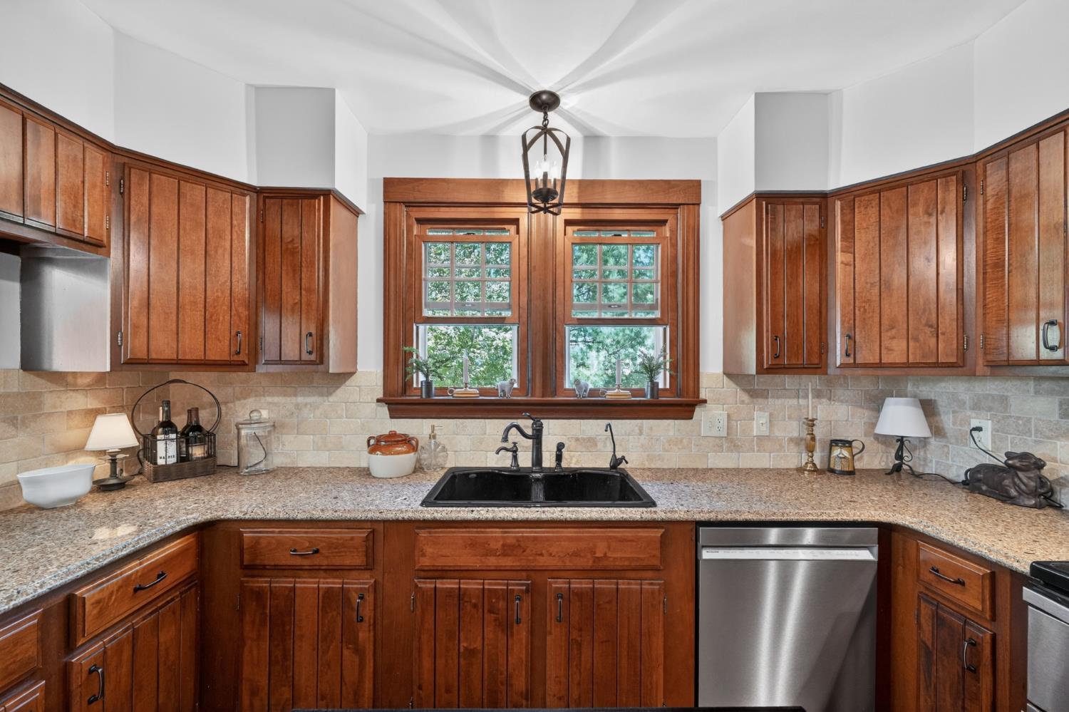 2179 Webb Road Brookville, IN 47012 - Photo 23 of 84 A large window over the kitchen sink offers pretty views of the gardens and woods.
