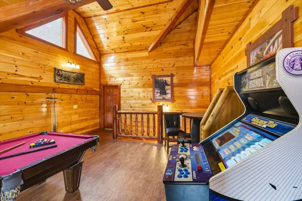 a bedroom with a bed and a view of walk in front of house