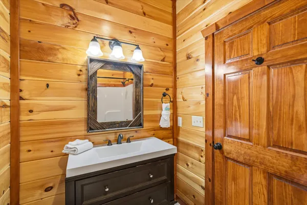 a view of a bathroom from a hallway